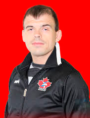 Justin Karn Official Judo Canada photo, red background 